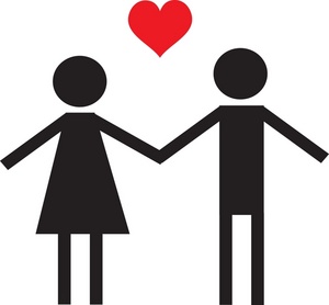 a bright red heart above the heads of a male and female silhouette holding hands